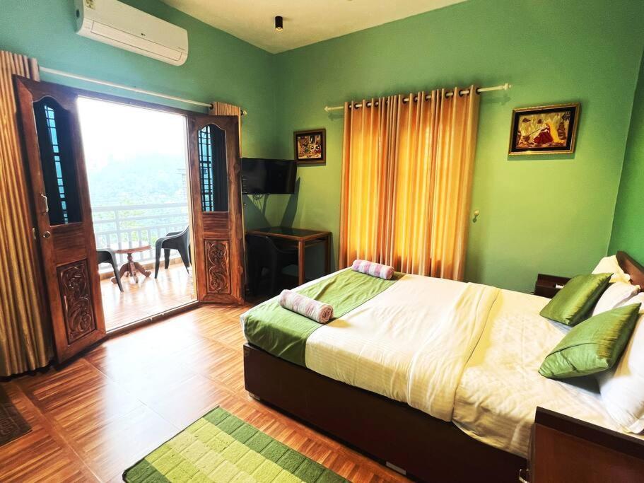 Munnar Blue Mist Bed & Breakfast ภายนอก รูปภาพ